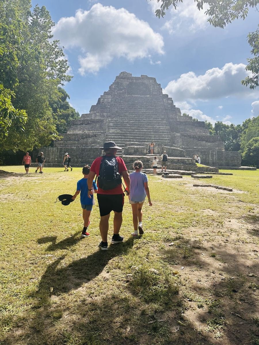 Family exploring the Chacchoben Mayan ruins
